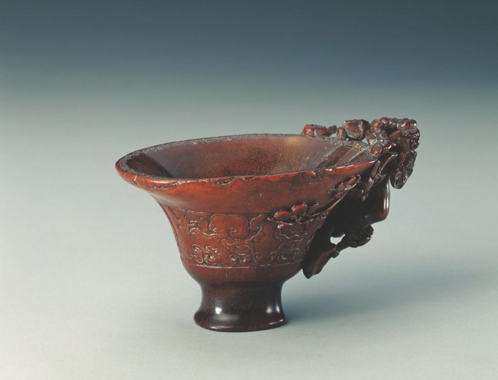 图片[1]-Rhinoceros horn carved plum branch handle antique animal face design cup-China Archive